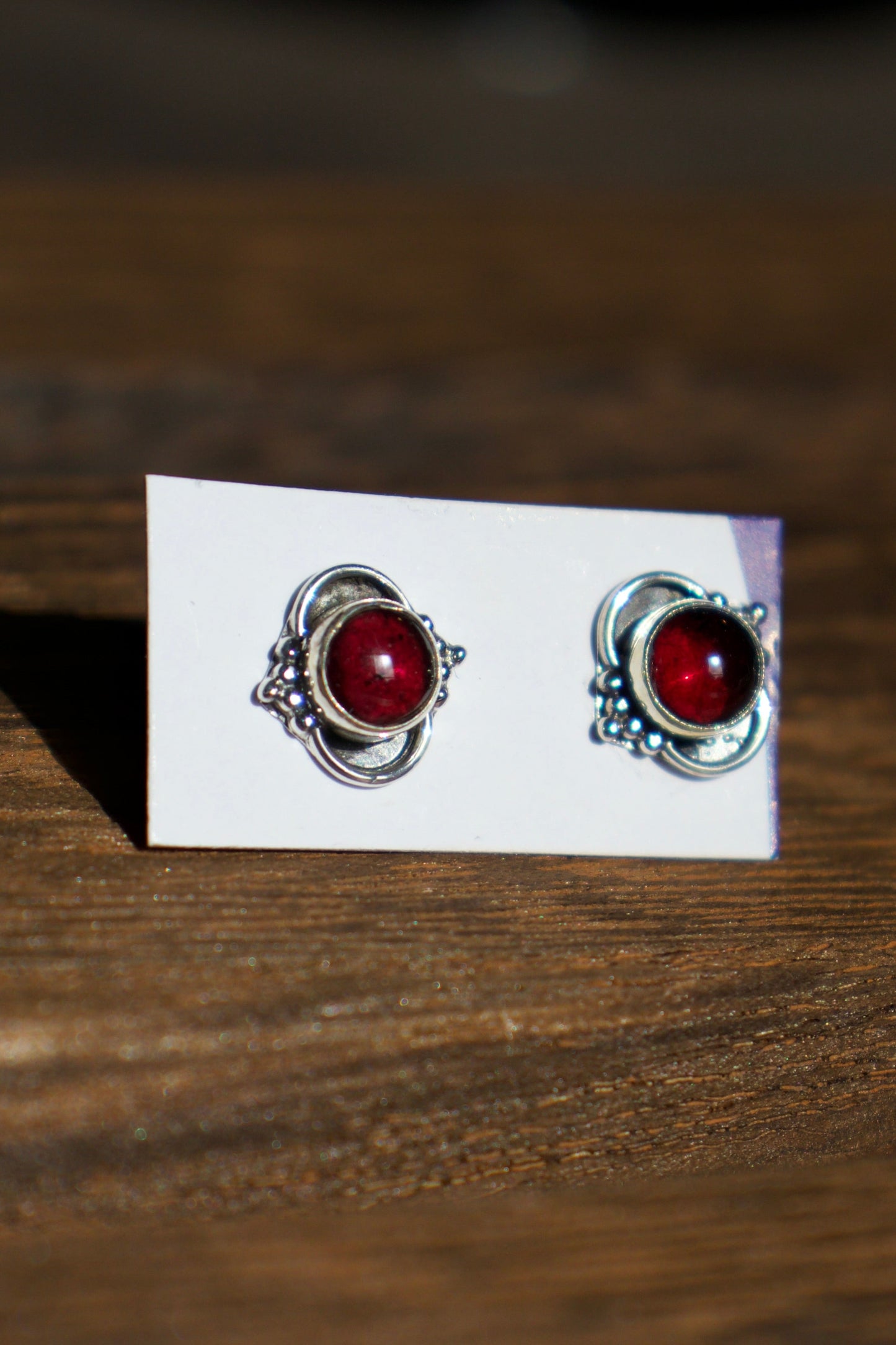 Garnet Stud Earrings with Sterling Silver Detailing